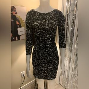 Beautiful Michael Kors dress. Size XS.  Color grey, white and black.